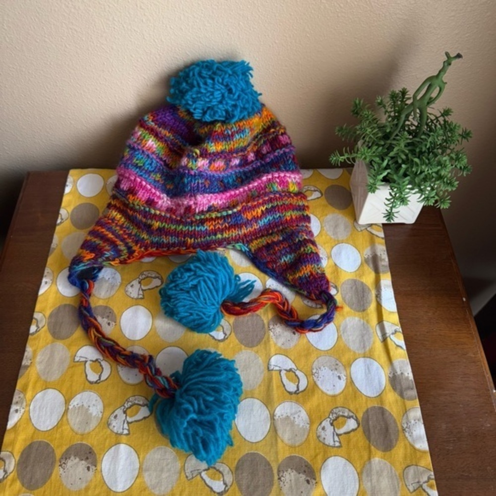 One of a Kind brand 100% wool colorful yarn knot cap with pompoms